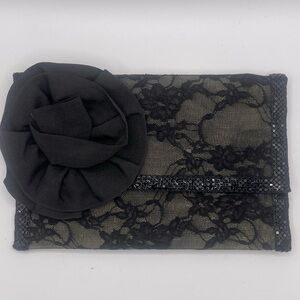Felix Rey | black lace clutch​